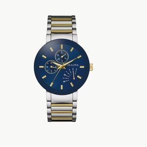 Stainless steel with silver and gold-tone finish, blue dial curved mineral glass